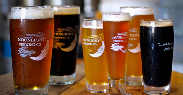 Family shot of various Moonlight Brewing beers in varying glass sizes