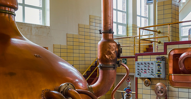 Copper kettles inside a brewhouse