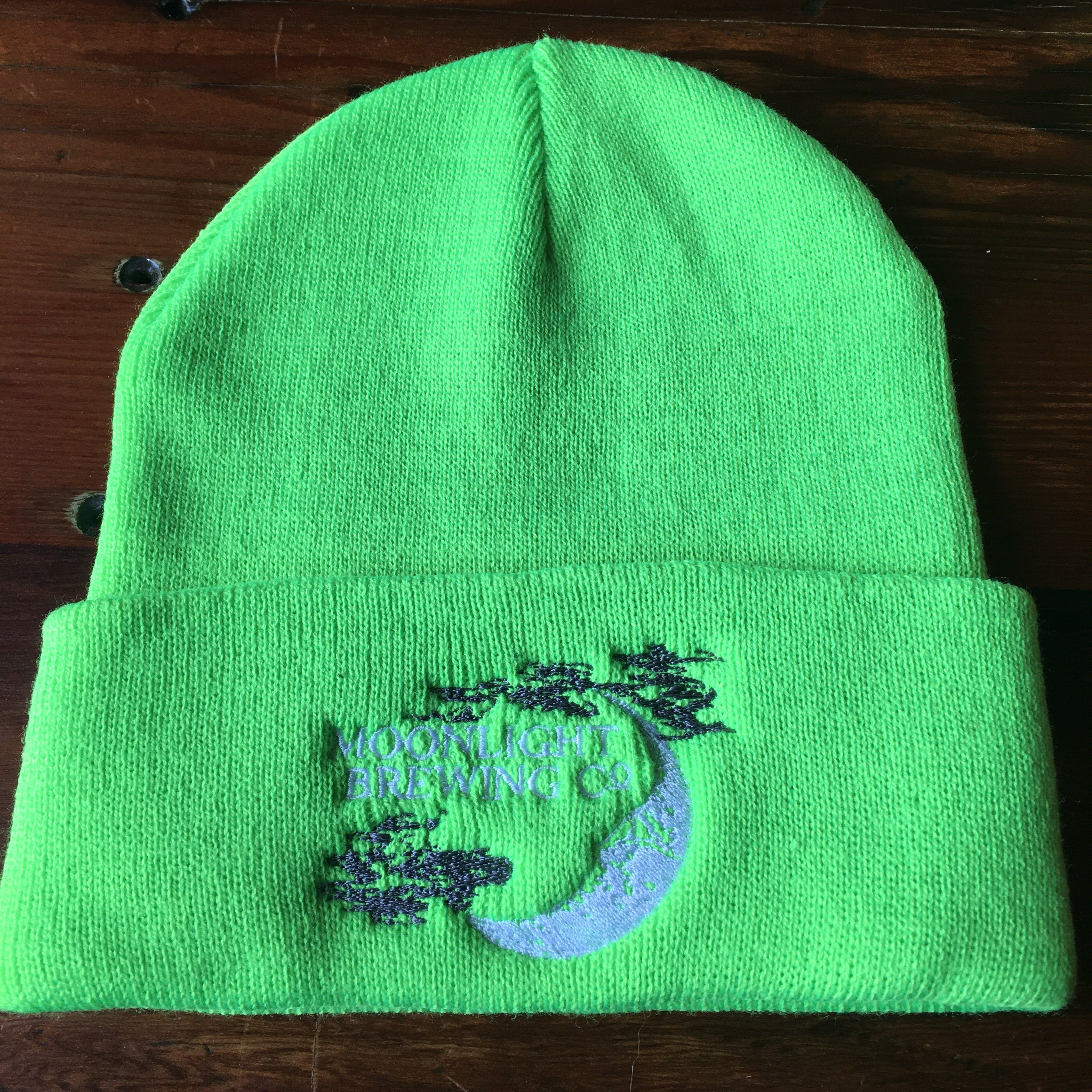 Green beanie with Moonlight Brewing logo on the front