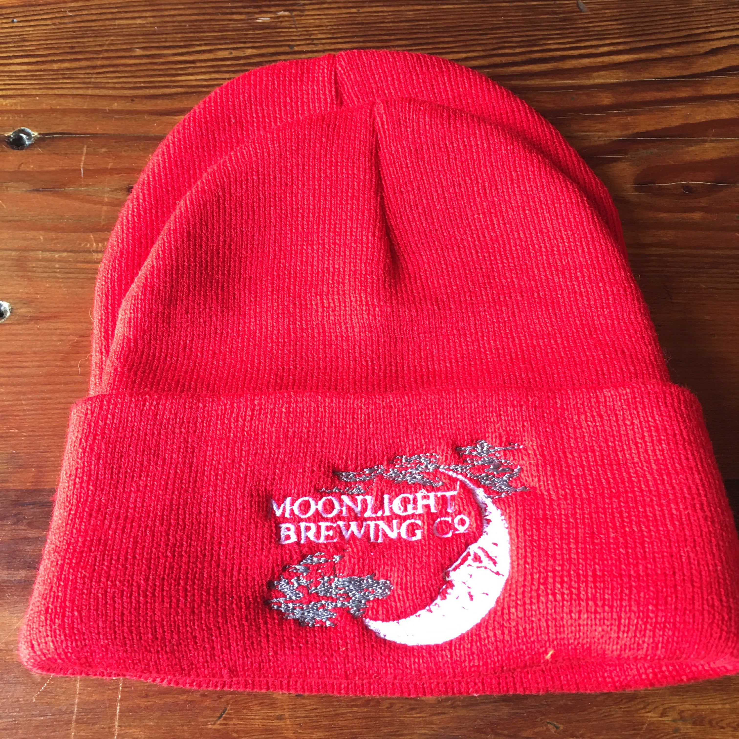 Red beanie with Moonlight Brewing logo on the front