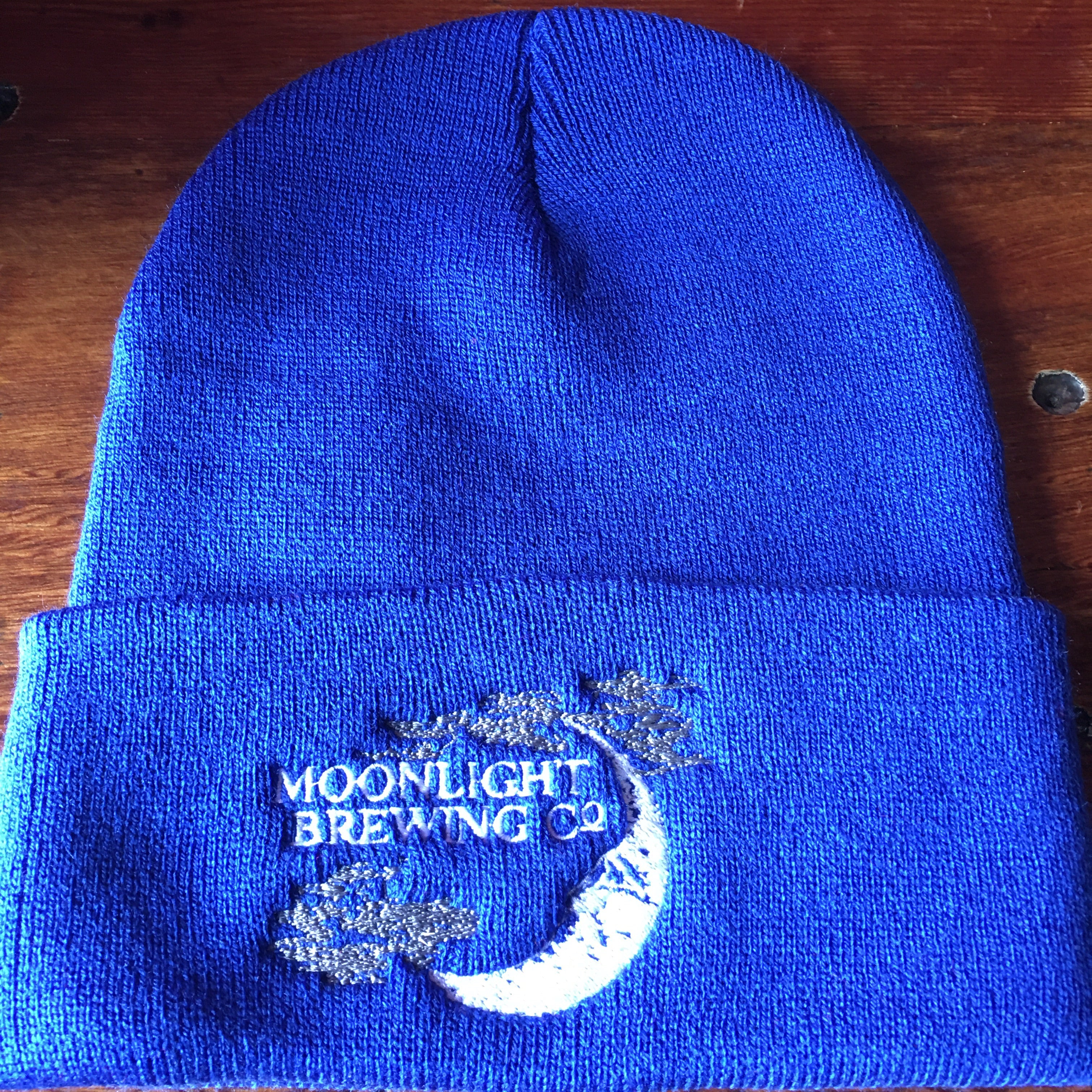 Blue beanie with Moonlight Brewing logo on the front